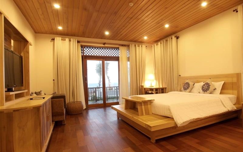 Phòng ngủ Aniise Villa Resort ấm cúng (Ảnh: BI Travel)