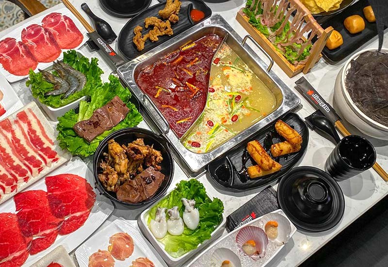 Nước dùng JiangHu buffet được chế biến theo yêu cầu.