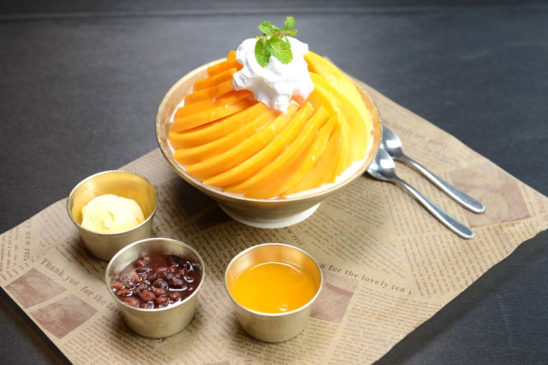 Bingsu xoài thơm ngon, với xoài chín ngọt.  (55 ký tự)